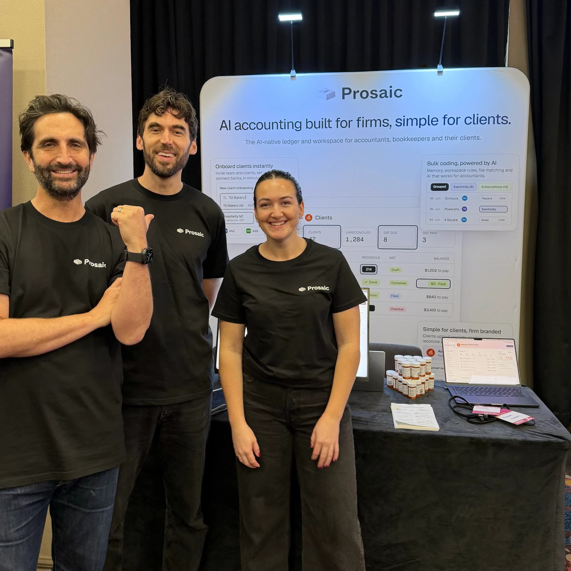The Prosaic team at an event stand